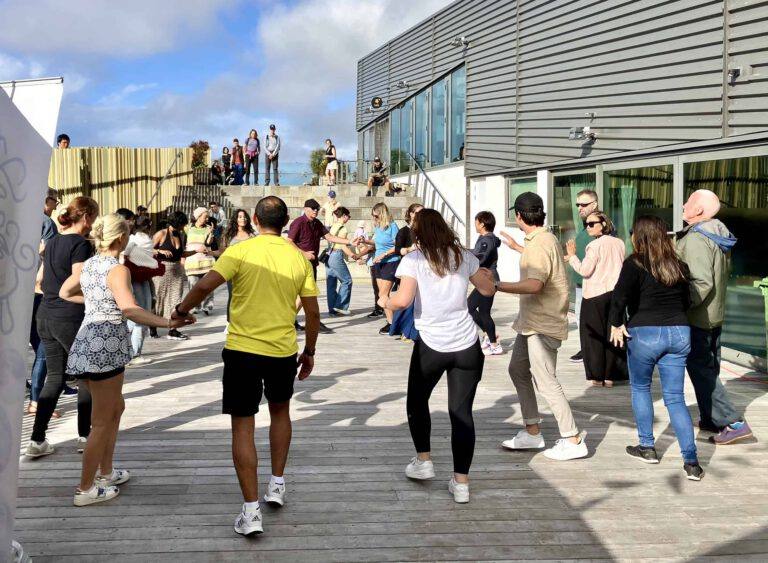 NSLD group salsa class at an outdoor dance event